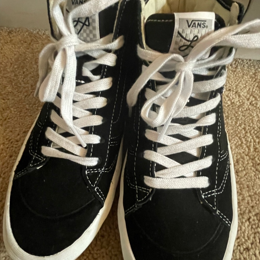 Vans Black and White Skate Shoe with Red Accents